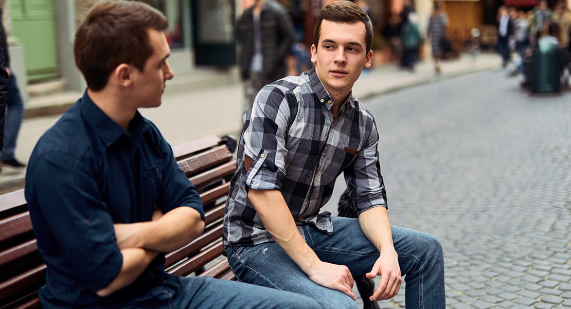 two young men talking to your spouse about collaborative divorce